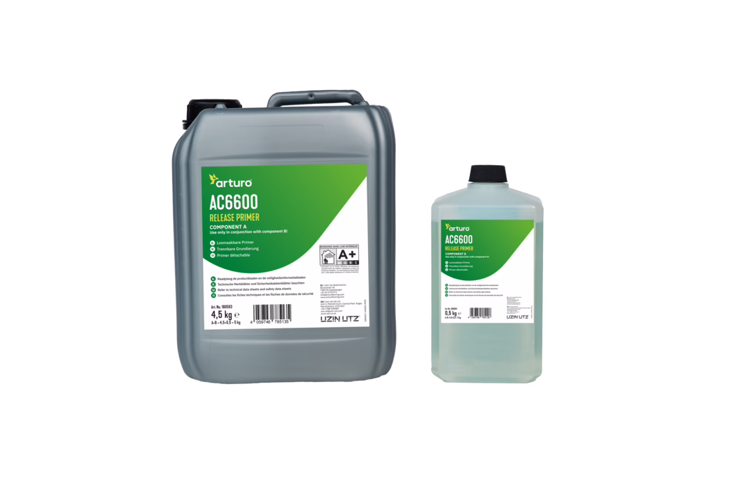 Arturo_Dummy_AC6600 Release Primer_2025-04 Two plastic containers of 'arturo AC6600 Release Primer' on a white background: a large grey 4.5 kg jerrycan labelled Component A with a green diagonal label and a smaller translucent 0.5 kg bottle labelled Component B; both have black screw caps and clear product labels.